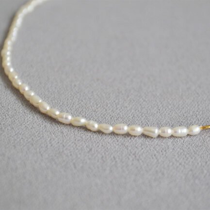 pearl necklace with gold pendant 7