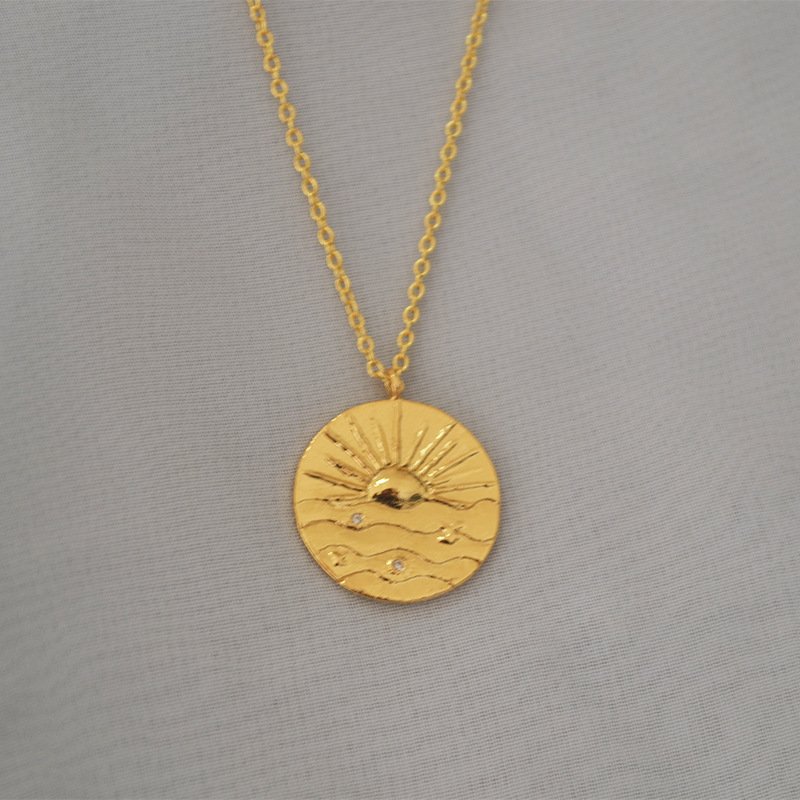 gold sun necklace 1