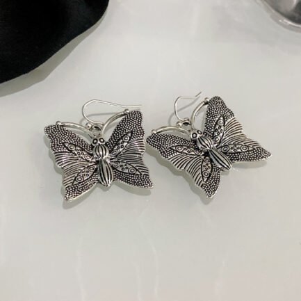 silver butterfly earrings paparazzi 0